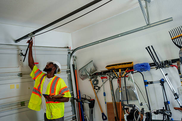 Professional Garage Door Panel Replacement technician working in Hillcrest, NY